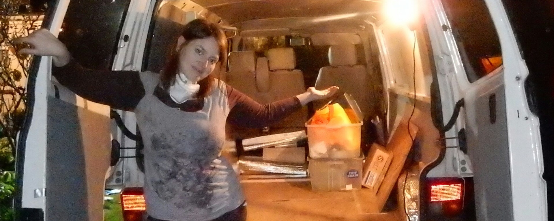 Me happy to finish the van insulation as the sun set
