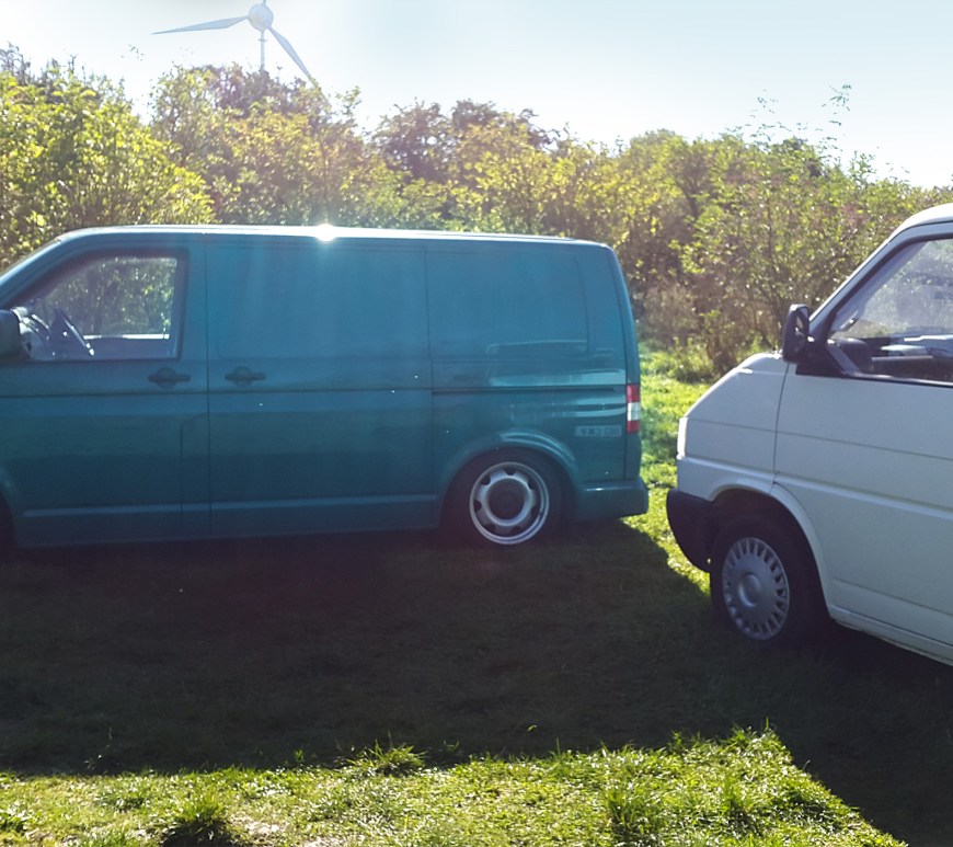 Vans parked at Thistledown Farm Campsite