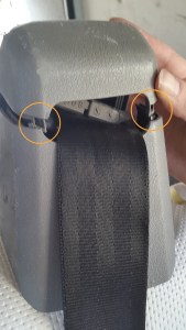 Clips on bench seat central belt cover