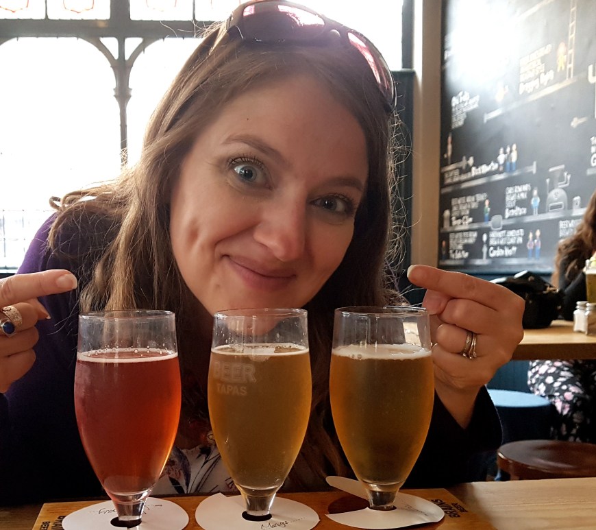 Enjoying a tasting rack at the Cambrian Tap